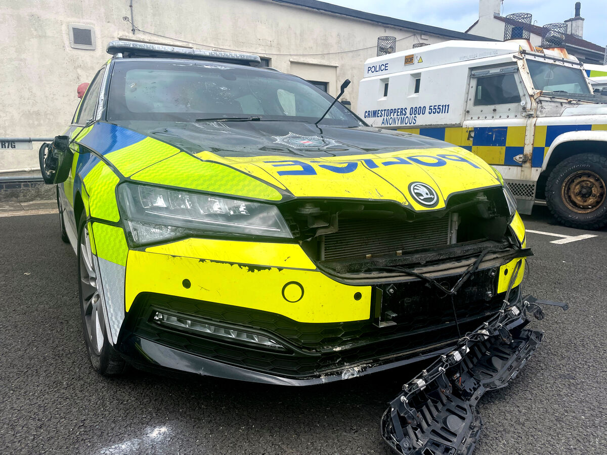 A view of a damaged police car outside Ballymena Police Service of Northern Ireland (PSNI) station, following a protest over an alleged sexual assault in the Co Antrim town. Picture: Tuesday June 10, 2025.
