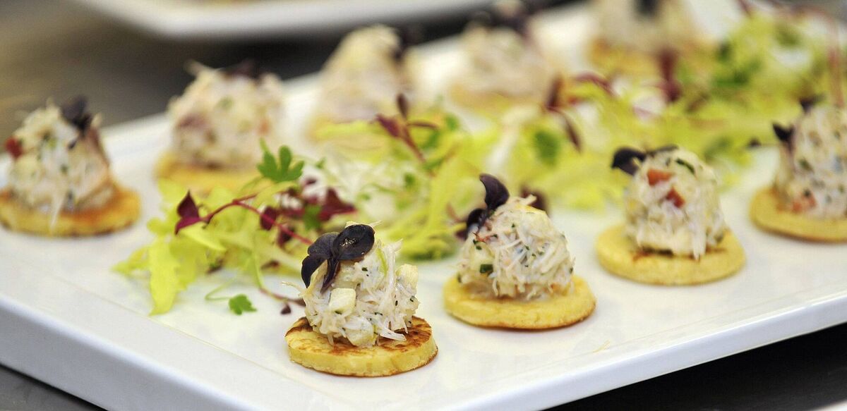 Would you rather fancy canapes or a crisp sandwich and a purple Snack? Picture: Nick Ansell/PA Wire