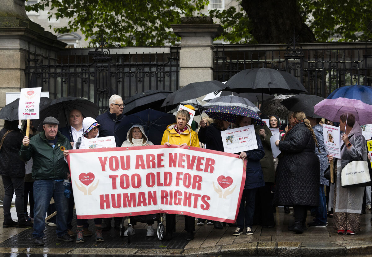 
                        The Care Champions Ireland demonstration outside Leinster House demanding safeguarding legislation and reform of care provisions. 
