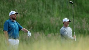 <p>OPENING ROUND: Good pals Rory McIlroy and Shane Lowry will lean on each other in hopes for a better second round . Pic: Patrick Smith/Getty Images</p>