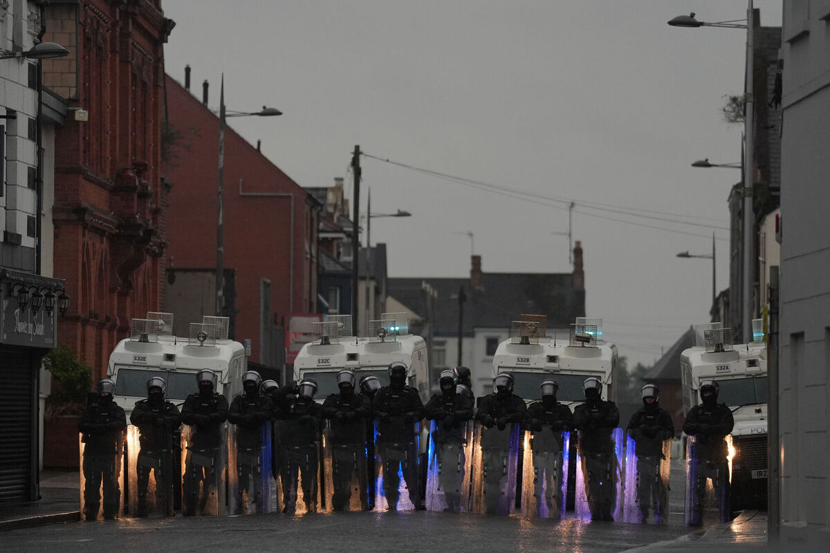 The violence began around Clonavon Terrace on Monday night following an earlier peaceful protest which was organised in support of the family of a girl who was the victim of an alleged sexual assault in the area. Picture: Brian Lawless/PA Wire
