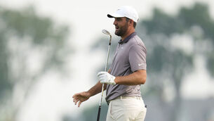 <p>Scottie Scheffler reacts after missing a putt on the 15th hole. Pic: AP Photo/Seth Wenig</p>