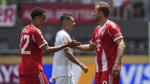 <p>NO MERCY: Jamal Musiala, left, hit a hat-trick after replacing Harry Kane (Joshua A. Bickel/AP)</p>