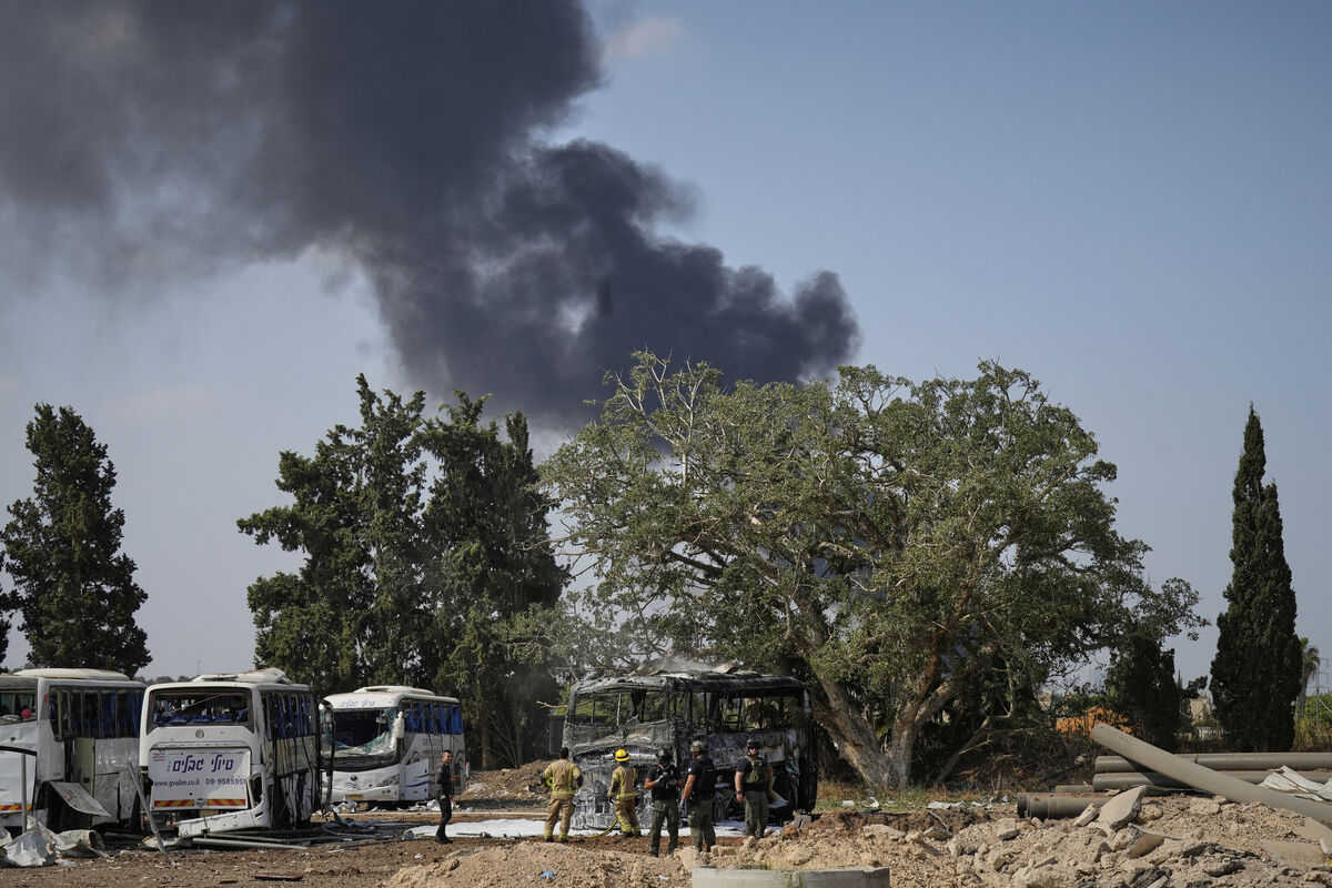 Israeli security forces inspect a site hit by a missile launched from Iran in central Israel on Tuesday, June 17, 2025. Picture: AP Photo/Baz Ratner Israeli security forces inspect a site hit by a missile launched from Iran in central Israel on Tuesday, June 17, 2025. Picture: AP Photo/Baz Ratner
