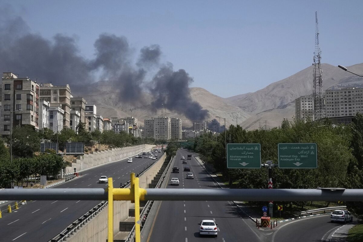 Smoke rises from an oil storage facility after it appeared to have been struck by an Israeli strike on Saturday, in Tehran, Iran, Monday, June 16, 2025. (AP Photo/Vahid Salemi) Smoke rises from an oil storage facility after it appeared to have been struck by an Israeli strike on Saturday, in Tehran, Iran, Monday, June 16, 2025. (AP Photo/Vahid Salemi)