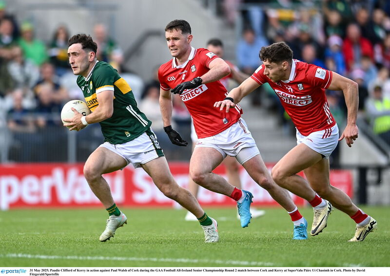 Paudie Clifford of Kerry in action against Paul Walsh of Cork. Photo by David Fitzgerald/Sportsfile Paudie Clifford of Kerry in action against Paul Walsh of Cork. Photo by David Fitzgerald/Sportsfile