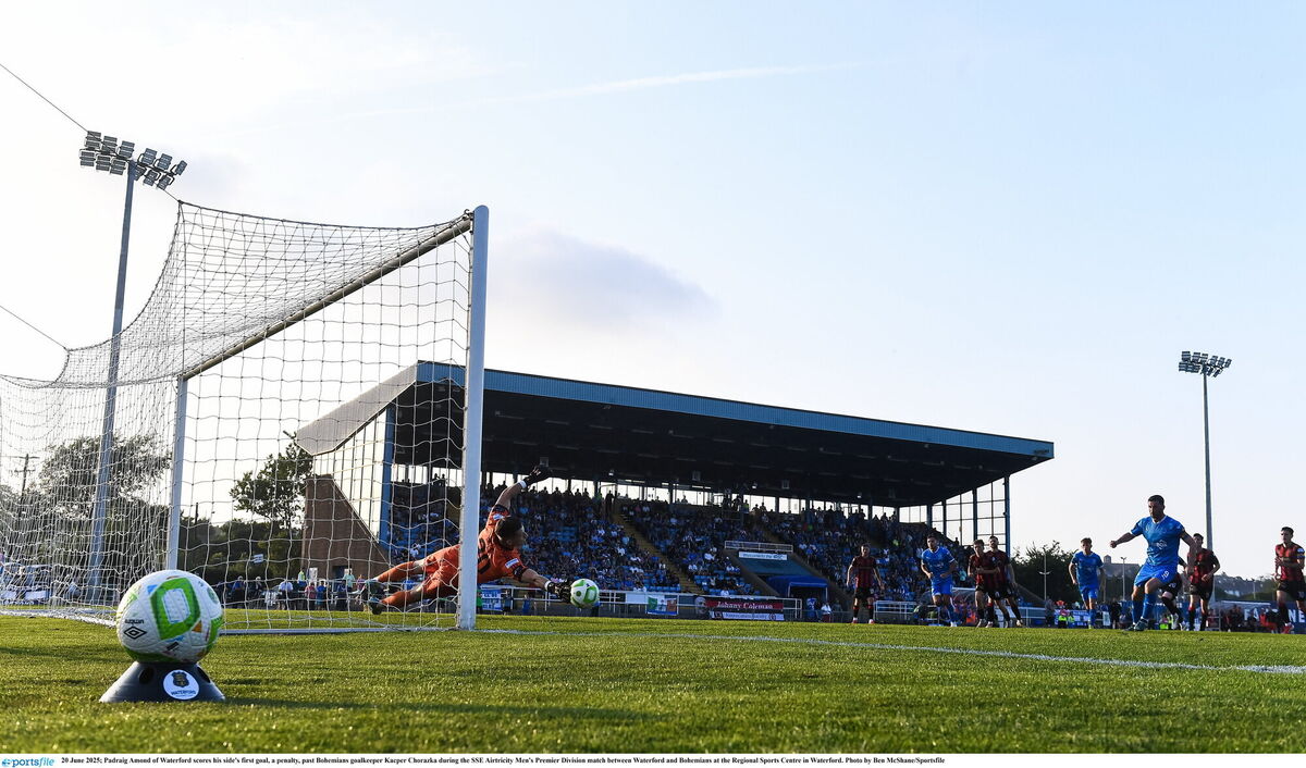 Padraig Amond of Waterford scores his side's first goal, a penalty, past Bohemians goalkeeper Kacper Chorazka. Pic: Ben McShane/Sportsfile.