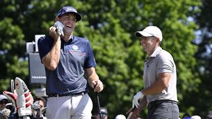 <p>FRIENDLY FIRE: Keegan Bradley, left, shares a light moment with Rory McIlroy, of Northern Ireland, right, as they start the first round of the Travelers Championship golf tournament at TPC River Highlands, Thursday, June 19, 2025, in Cromwell, Conn. (AP Photo/Jessica Hill)</p>