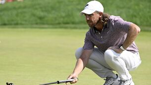 <p>Tommy Fleetwood lines up his putt on the ninth green during the third round of the Travelers Championship (Jessica Hill/AP)</p>