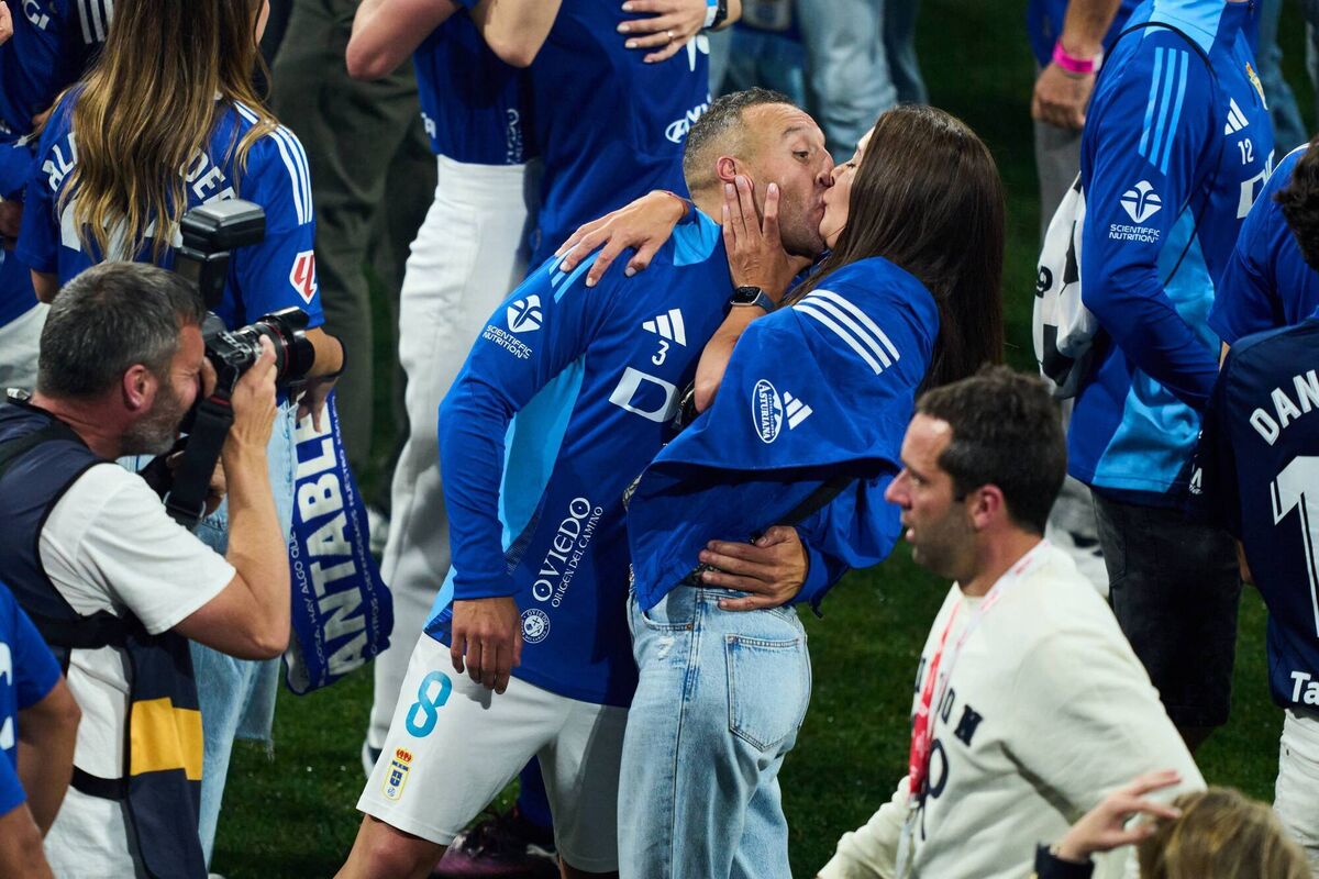 SEALED WITH A KISSL: Santi Cazorla cops a smacker after his side's La Liag play off win.