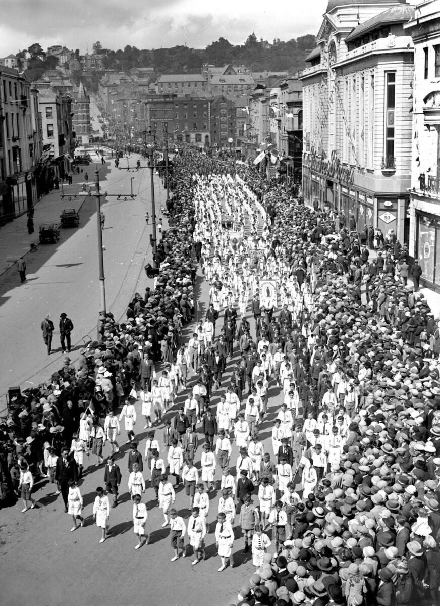 The annual Eucharistic Procession passing through St Patrick's Street, Cork in 1928. Picture: Irish Examiner Archive The annual Eucharistic Procession passing through St Patrick's Street, Cork in 1928. Picture: Irish Examiner Archive