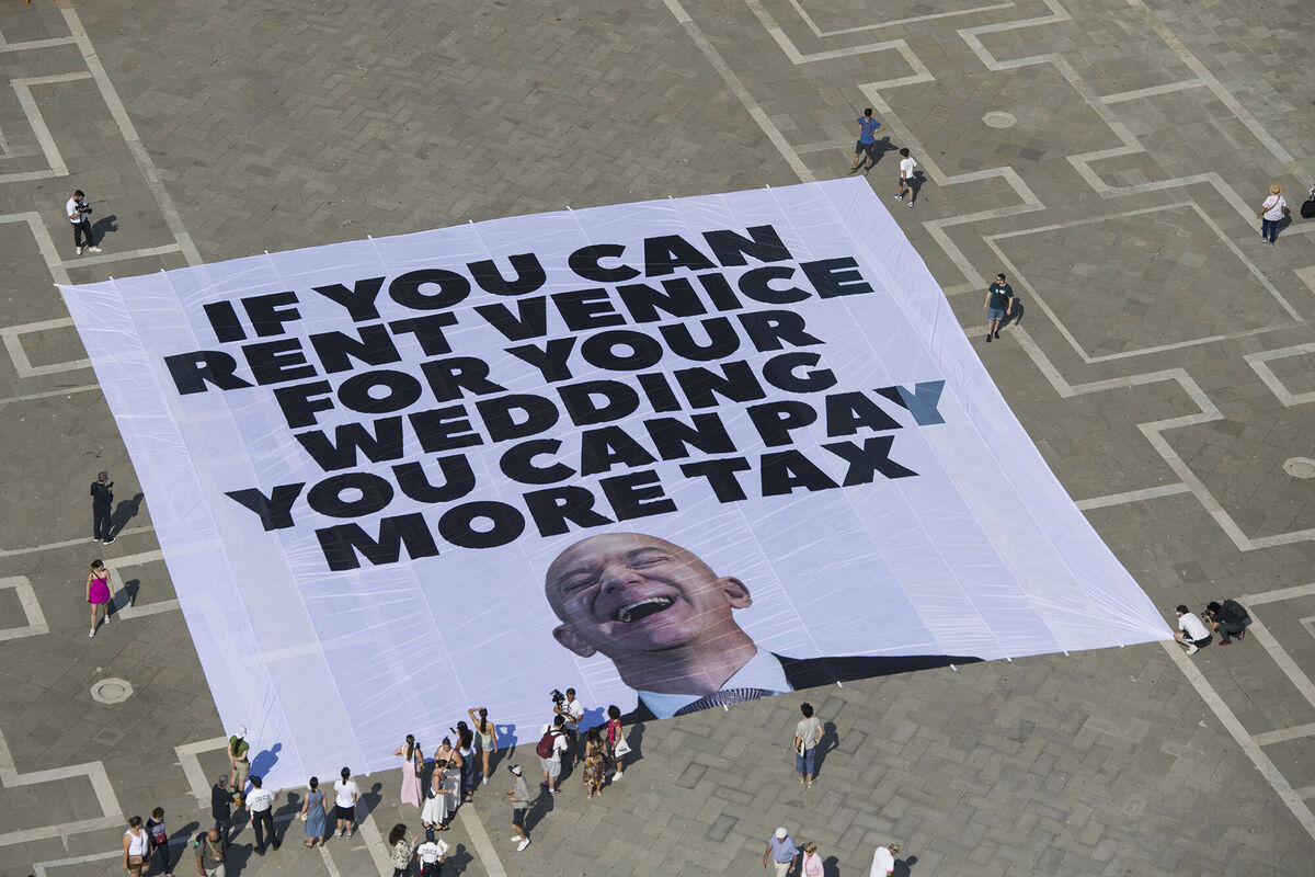 A banner in St Mark’s Square unfurled by Greenpeace Italia and Everyone Hates Elon. Picture: Greenpeace via AP