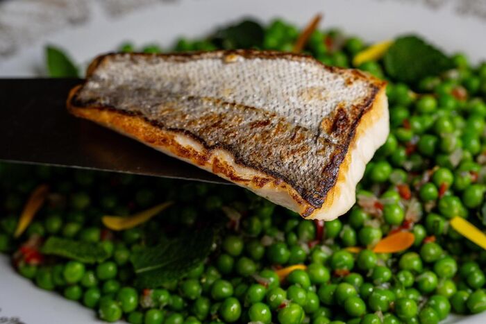 Hake tails with chilli-mint peas