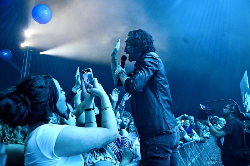 Danny O’Reilly of The Coronas in the pit giving high-fives to delighted fans during their Live at the Marquee gig in Cork. Picture: Chani Anderson Danny O’Reilly of The Coronas in the pit giving high-fives to delighted fans during their Live at the Marquee gig in Cork. Picture: Chani Anderson