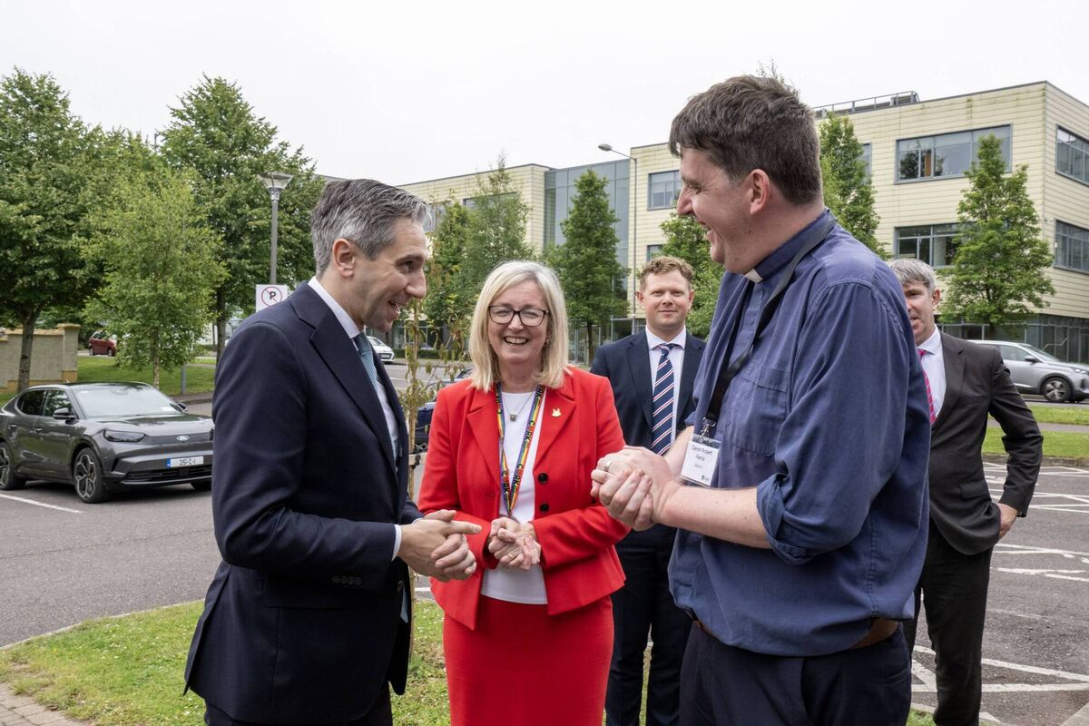 Tánaiste Simon Harris was greeted by the Rector of the Carrigrohane Union of Parishes and the Carraig Centre, Canon Robert Ferris and Rebecca Loughrey, Director of Services, Corporate, Community and Culture Affairs, Cork City Council. Picture: Brian Lougheed 
