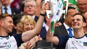 <p>Limerick's strength and conditioning coach Joe O'Connor, left, and coach Paul Kinnerk lift the Liam MacCarthy Cup on August 19, 2018, after their GAA Hurling All-Ireland Senior Championship Final against Galway at Croke Park. File picture: Seb Daly/Sportsfile</p>