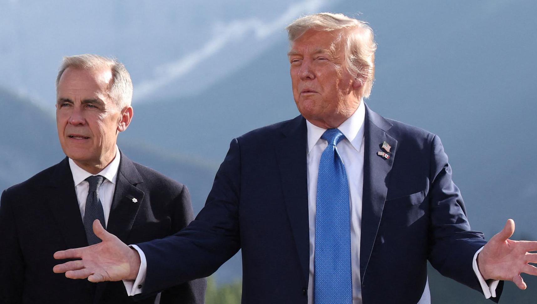 Canada's prime minister Mark Carney, US president Donald Trump. The two nations will resume trade talks. Picture:   Suzanne Plunkett/PA Wire