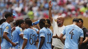 <p>Manchester City manager Pep Guardiola talks to his players during the Club World Cup group G. match. Pic: AP Photo/Derik Hamilton.</p>