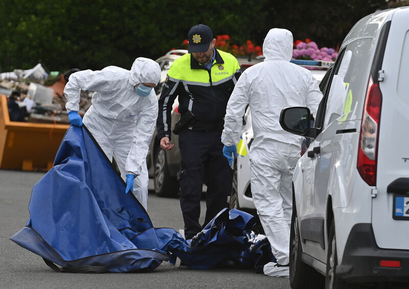 Members of the Garda forensic team at the house in Glounthaune where a couple in their 80s were found dead. Picture: Dan Linehan Members of the Garda forensic team at the house in Glounthaune where a couple in their 80s were found dead. Picture: Dan Linehan
