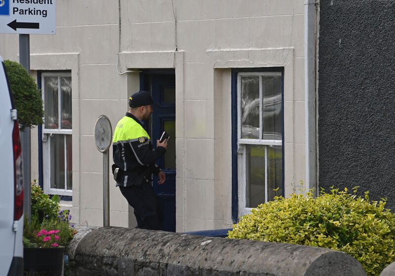 A garda on duty at the house in Glounthaune Village, Cork where a couple in their 80's were found dead. Picture Dan Linehan A garda on duty at the house in Glounthaune Village, Cork where a couple in their 80's were found dead. Picture Dan Linehan