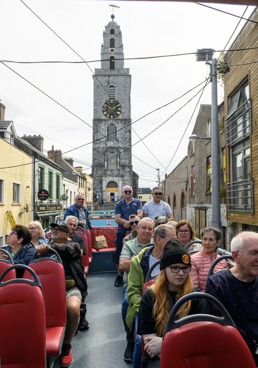  The Hop On/Hop Off Cork City Sightseeing Tours bus passing Shandon.