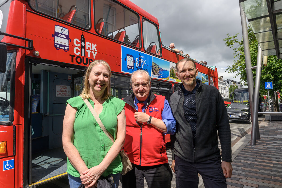  Driver Tony Long with Joan and David Taylor at the Hop On/Hop Off bus: 'The first thing I said to myself when we arrived at our hotel was 'not more graffiti'.
