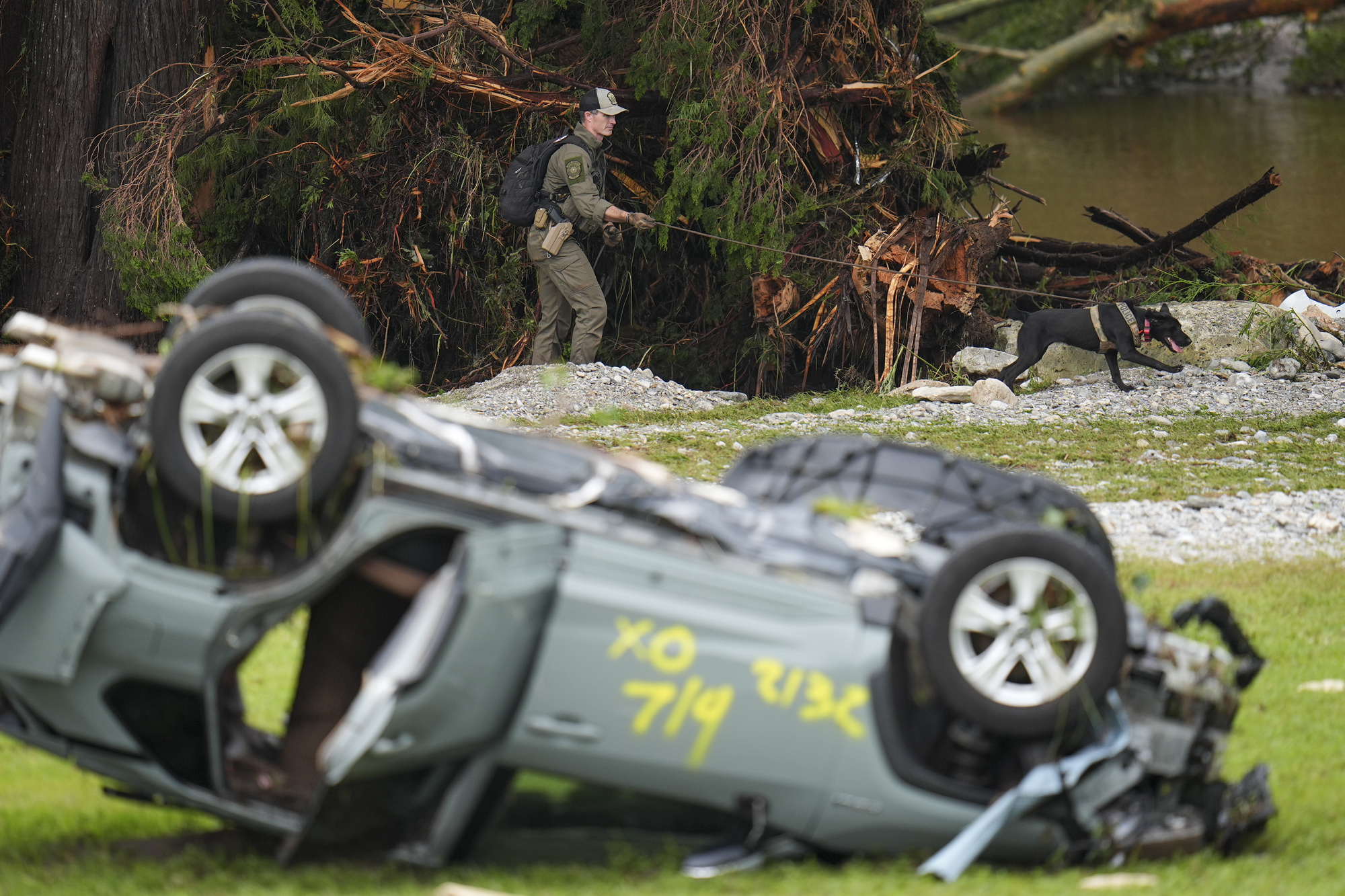 Latest toll shows 14 children among 32 dead in Texas flooding