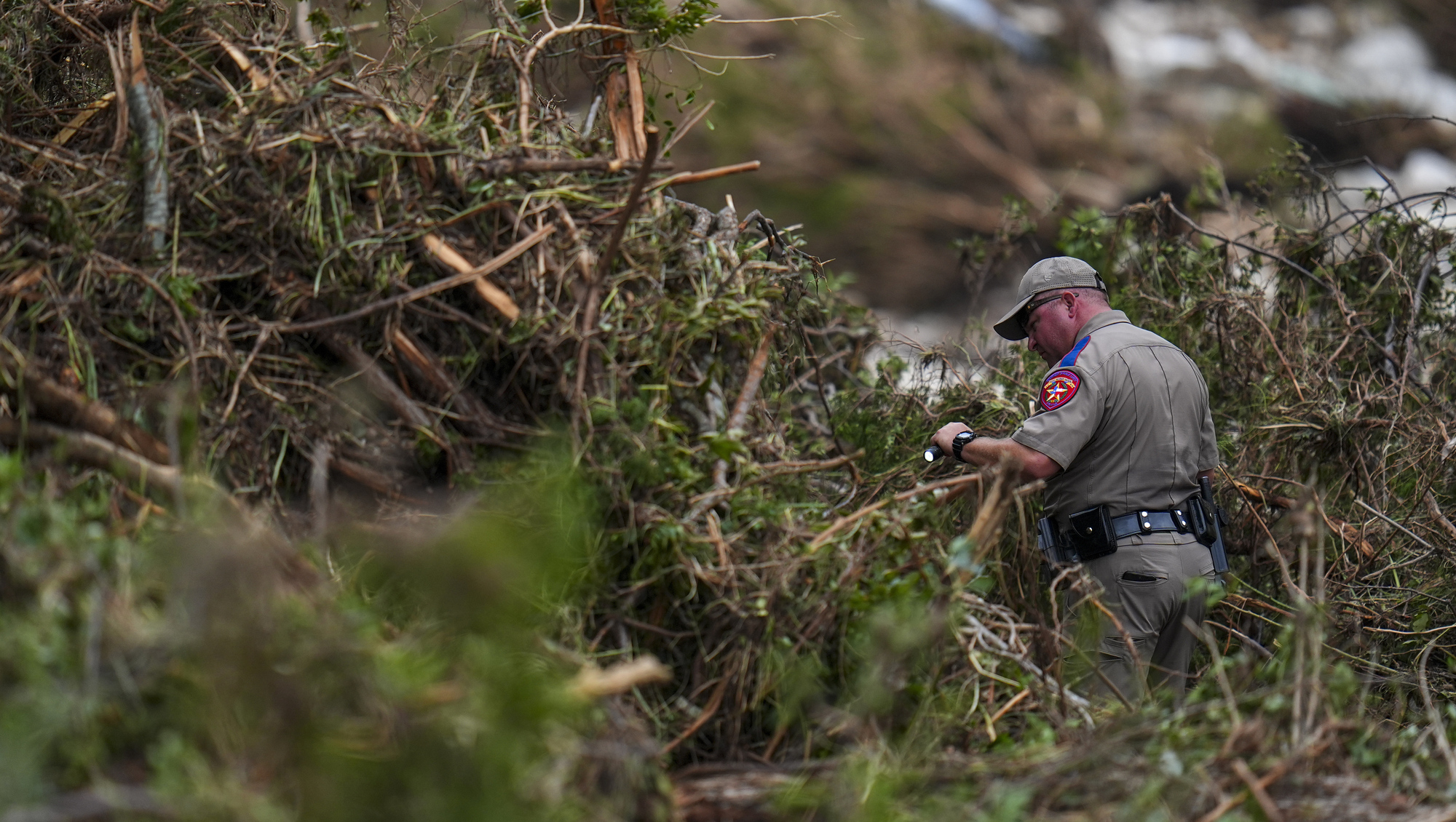 Texas floods leave at least 51 dead, 27 girls missing as rescue efforts continue