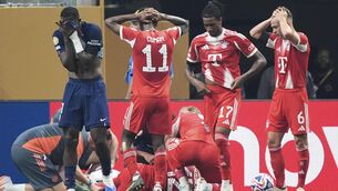 <p>Jamal Musiala lies on the ground during the Club World Cup quarterfinal soccer match between PSG and Bayern Munich. Pic: AP Photo/Mike Stewart.</p>