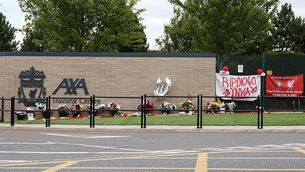 <p>Flowers and tributes outside the AXA Training Centre, Liverpool. Pic: Peter Byrne/PA Wire.</p>