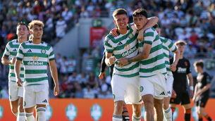 <p>Celtic’s Colby Donovan is congratulated by teammates. Pic: Ken Sutton/Inpho</p>
