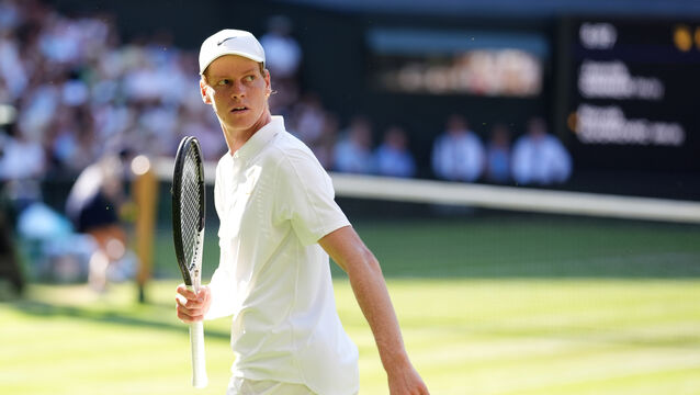 <p>Jannik Sinner turns to his box (John Walton/PA)</p>