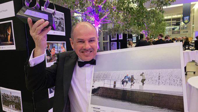 Tributes paid to award-winning photographer after fatal crash