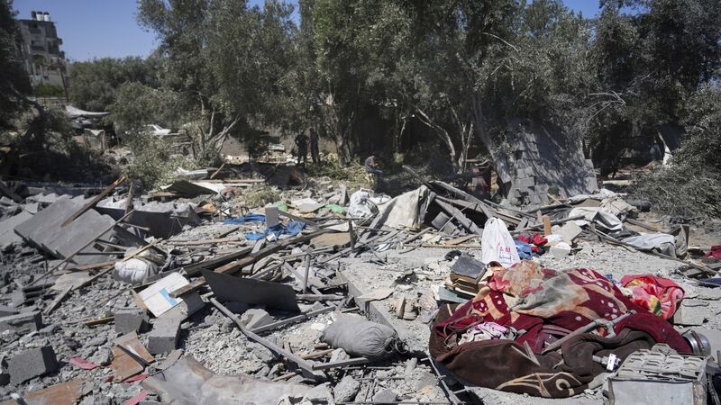 Six children among 10 people killed at water collection point by Israeli strike