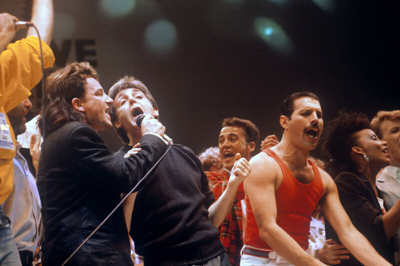 Bono, Paul McCartney and Freddie Mercury at Live Aid.