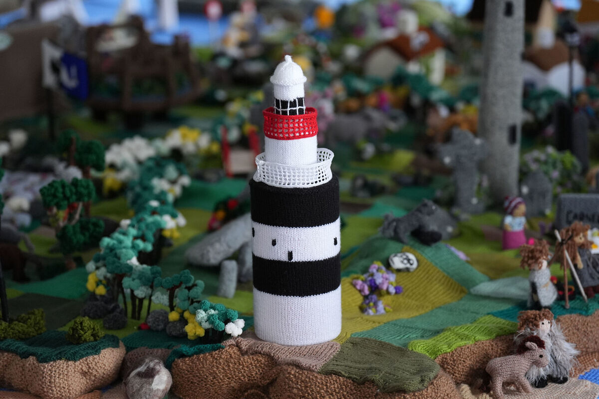Group member Ann Edwards said Hook Head lighthouse on the knitted map was' particularly nice and colourful'. Picture: Niall Carson/PA Wire