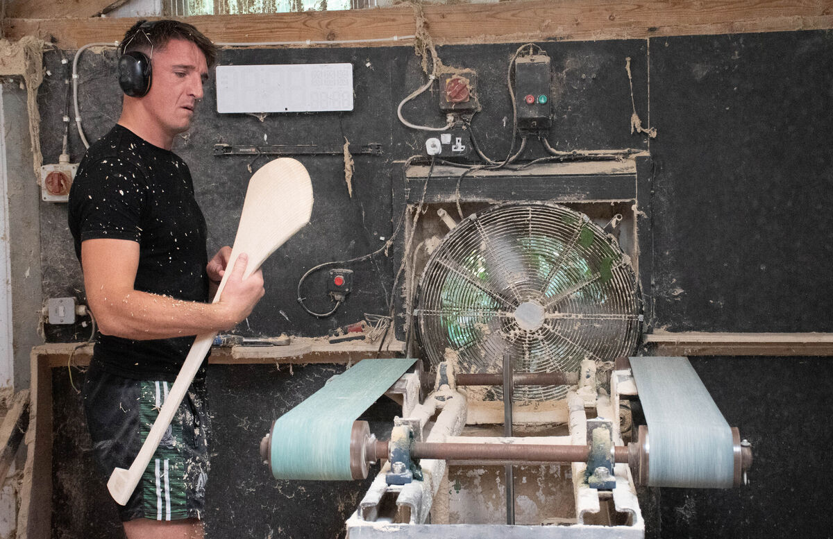 Aidan seen checking on a hurley during the sanding process in his workshop in Kanturk. Picture: Howard Crowdy Aidan seen checking on a hurley during the sanding process in his workshop in Kanturk. Picture: Howard Crowdy