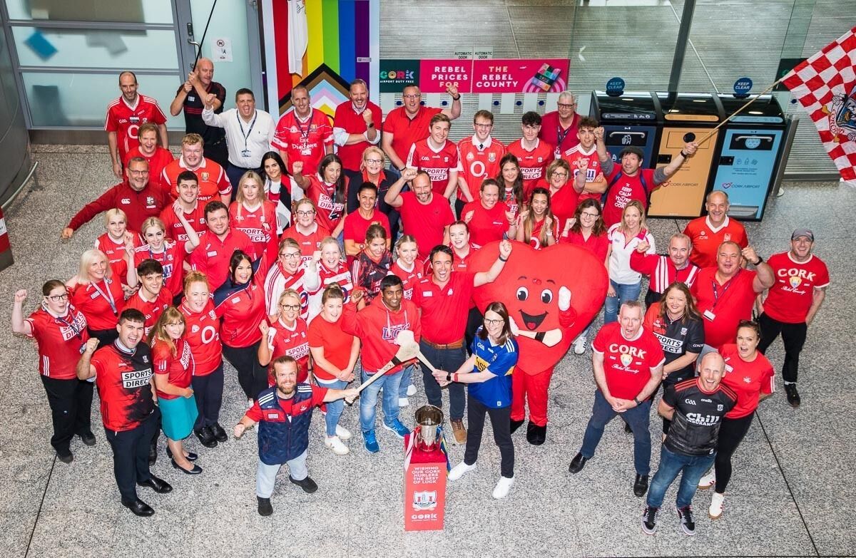 Sue Crowley bravely displays her Tipp jersey on 'Red and White Day' at Cork Airport. Picture: David Creedon