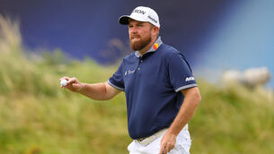 <p>UP AND RUNNING: Shane Lowry after finishing his round. Pic: INPHO/Ben Brady</p>