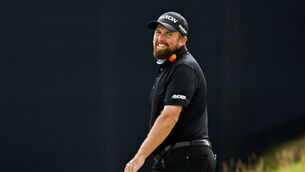<p>LOW SCORE FINISH: Shane Lowry reacts on the 18th green during the final round. Pic: Ramsey Cardy/Sportsfile</p>