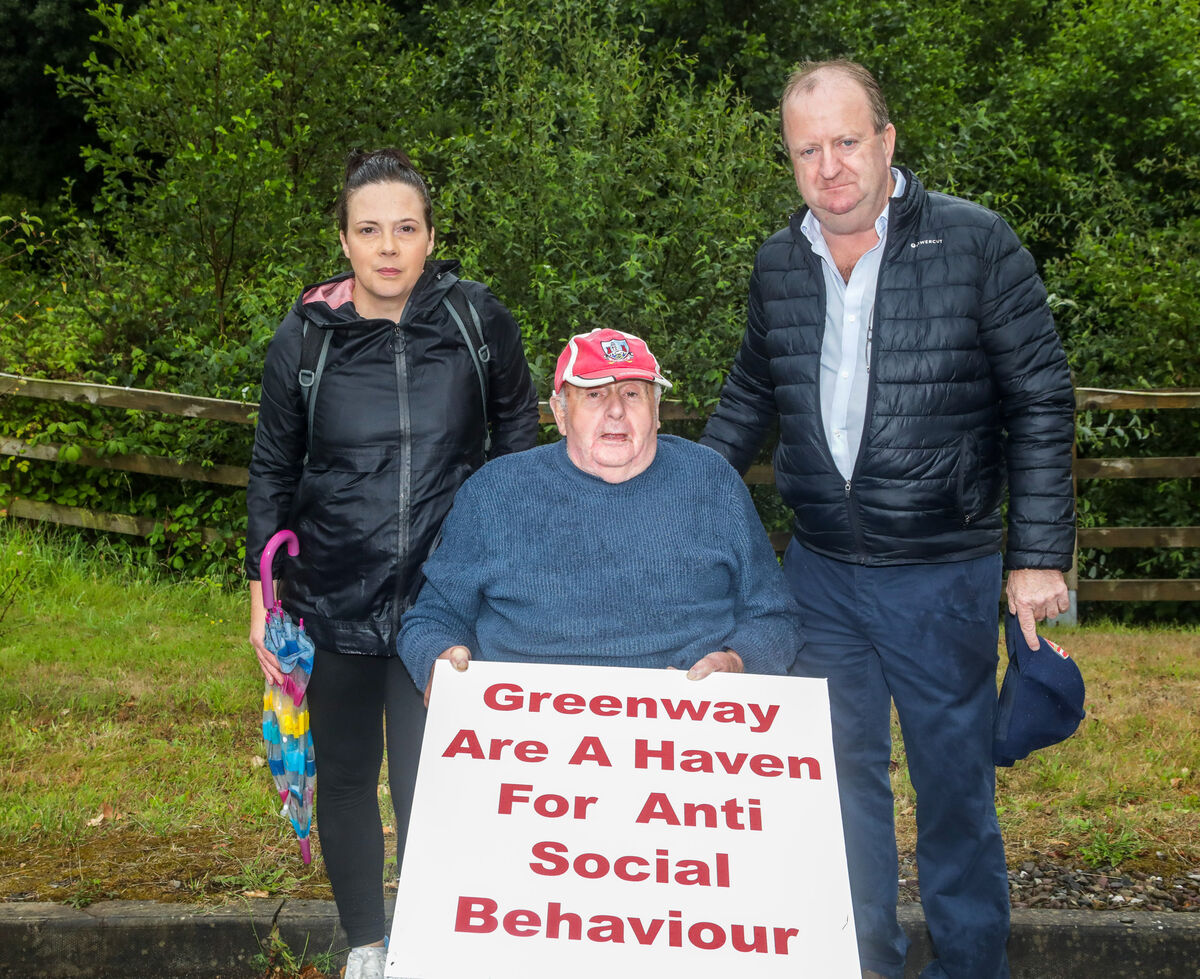 Deputy Michael Collins TD with Noreen and Patrick Ring, who are protesting against Cork County Council plans for the Cork to Kinsale greenway at the Viaduct in Cork. Picture: David Creedon Deputy Michael Collins TD with Noreen and Patrick Ring, who are protesting against Cork County Council plans for the Cork to Kinsale greenway at the Viaduct in Cork. Picture: David Creedon