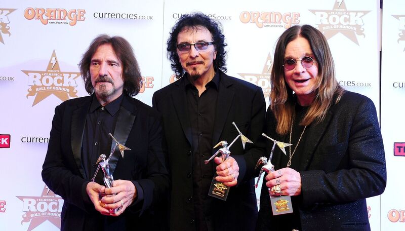From left: Geezer Butler, Tommy Iommi, and Ozzy Osbourne from Black Sabbath with their Album of the Year award for '13', Event of the Year, and Living Legend award at the Classic Rock Roll of Honour at The Roundhouse, Camden, London. Picture: Ian West/PA