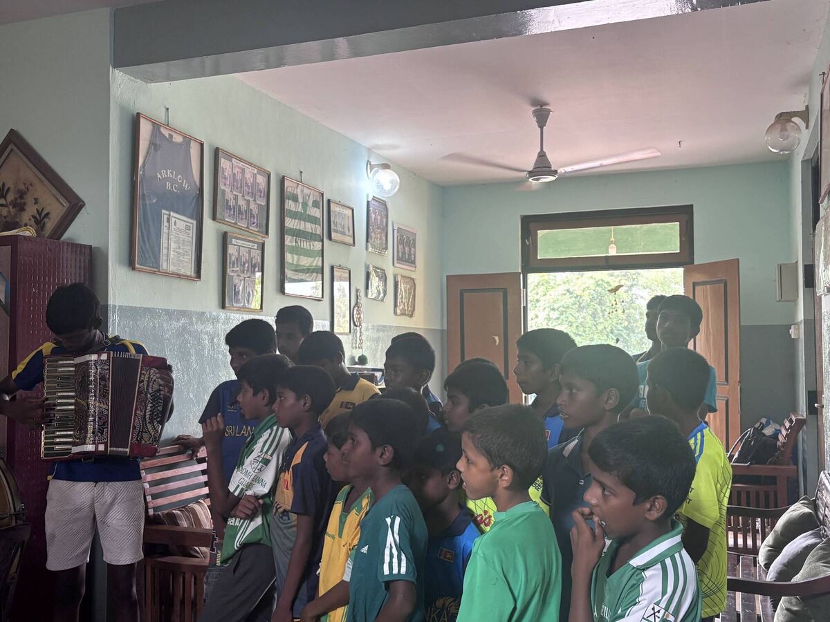On the other side of the home's main hall the boys gathered around with a few instruments – an accordion, a trumpet and a big drum as they played a rendition of the Irish national anthem.