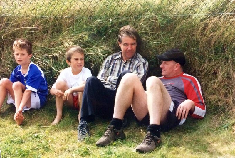 Schoolmates PJ Mac Láimh, Brian Ó Beaglaoich, Ciarán Ó Beaglaoich (Brian's Dad) and Alastair Mac Gearailt taking in a game in Gallarus