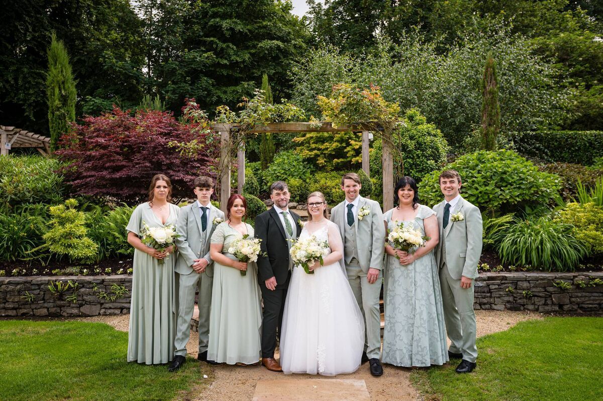 Deana Hurley and Eric O'Leary with their wedding party. 