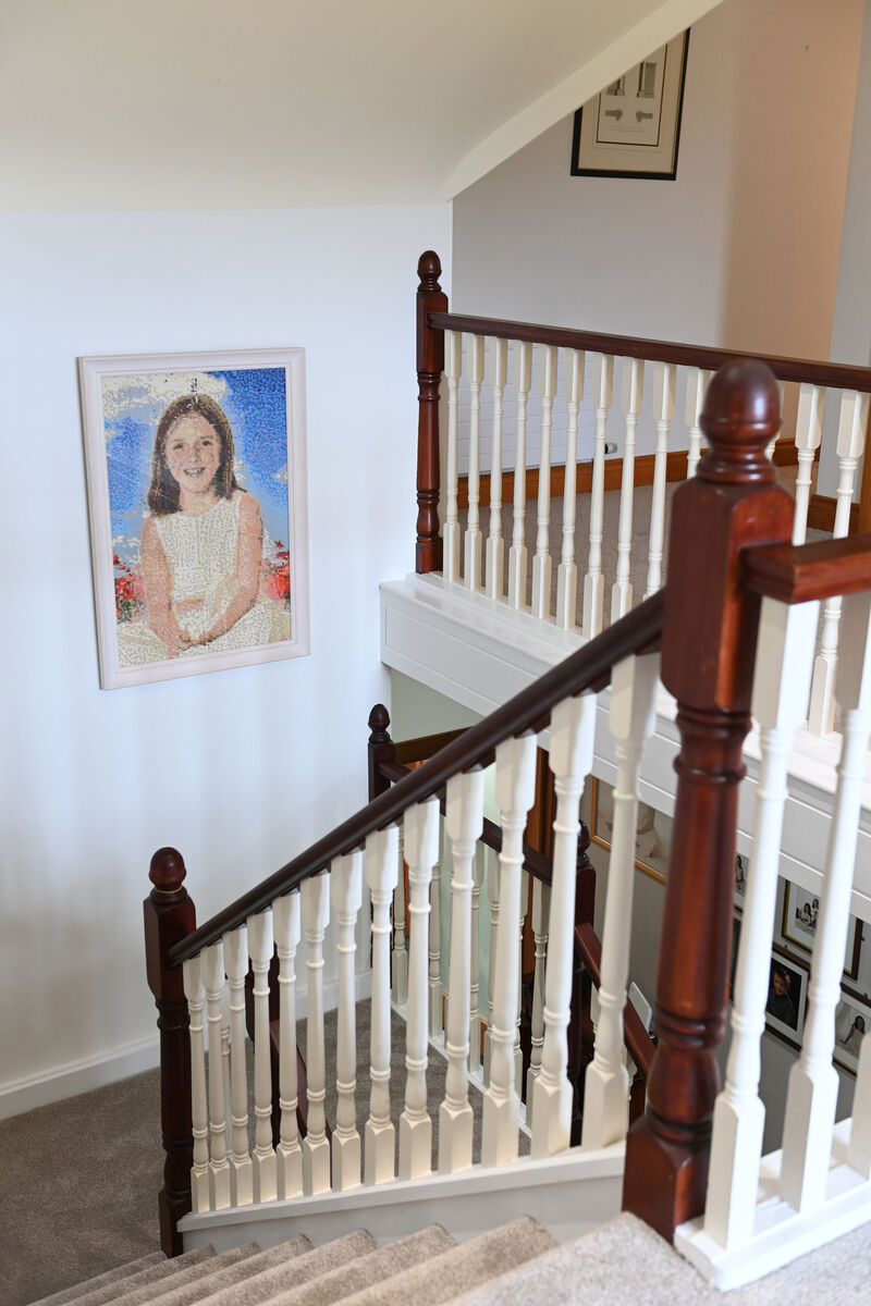 Mosaic portrait of Grace Nolan hanging on the stairs of the family home at Moneygourney.  Picture Larry Cummins