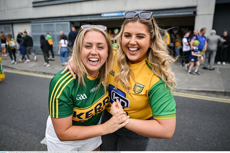 Kerry and Donegal played the All-Ireland final in their alternate kits, but many supporters in Croke Park  wore the green and gold of both counties —including Kerry supporter Éadaoin McGinley, from Tralee, left, and Donegal supporter Shannon Friel from Castlefin. Picture: David Fitzgerald/Sportsfile