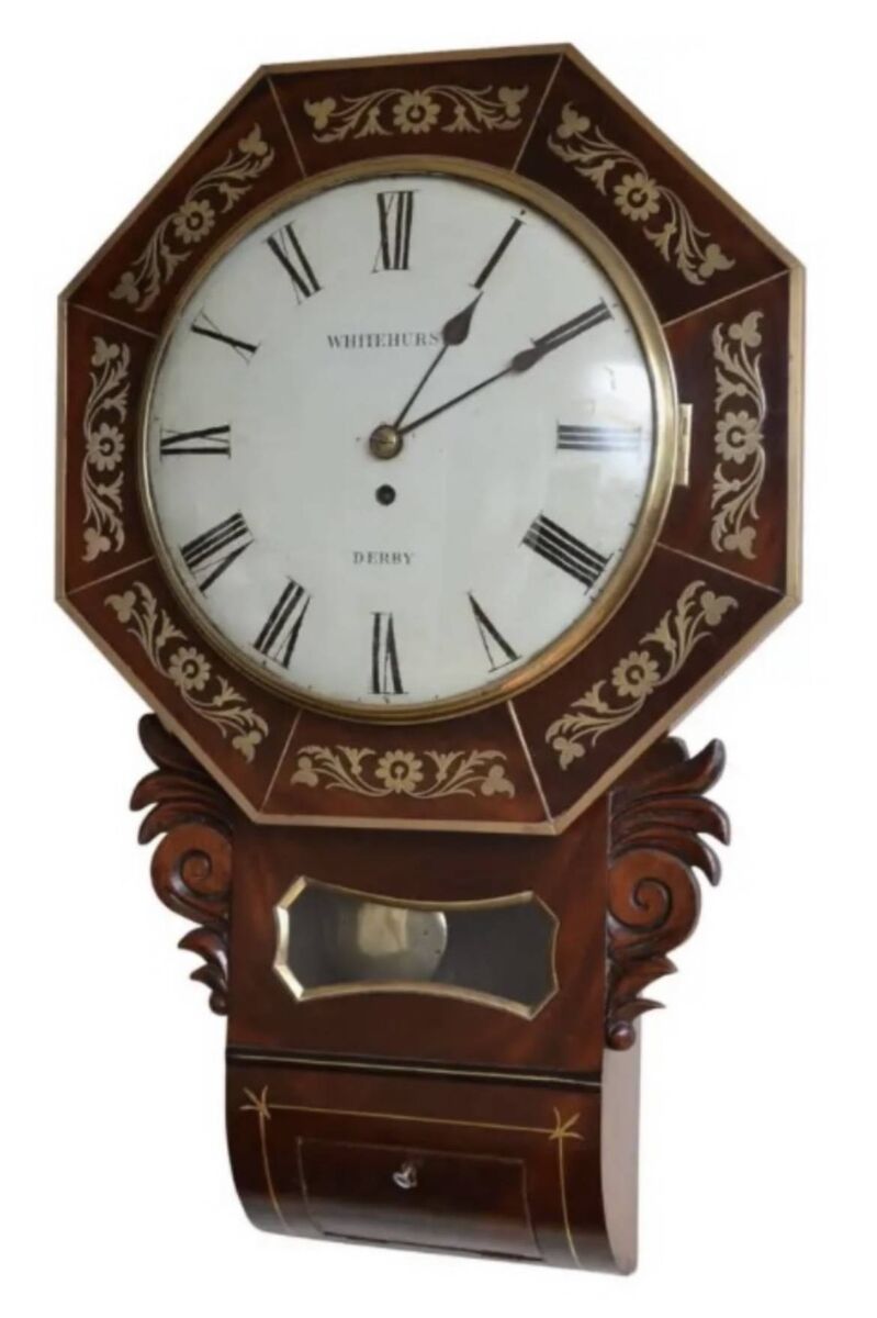 A double fusee wall clock at the Birr antique fair.