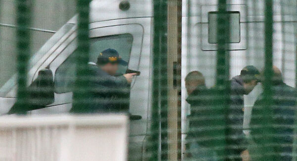 Armed Gardaí approach a security cash in transit van in the cargo area of Dublin Airport this morning. Picture Colin Keegan. Armed Gardaí approach a security cash in transit van in the cargo area of Dublin Airport this morning. Picture Colin Keegan.