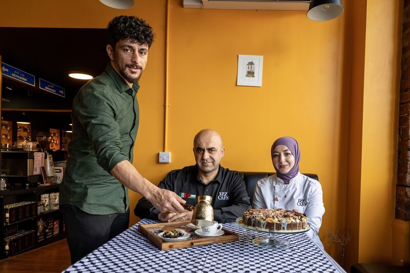 Izz and Eman Alkarajeh pictured at Izz Café, Cork City, as chef Habib Al Ostaz pours traditional Palestinian coffee. Picture Chani Anderson. Izz and Eman Alkarajeh pictured at Izz Café, Cork City, as chef Habib Al Ostaz pours traditional Palestinian coffee. Picture Chani Anderson.